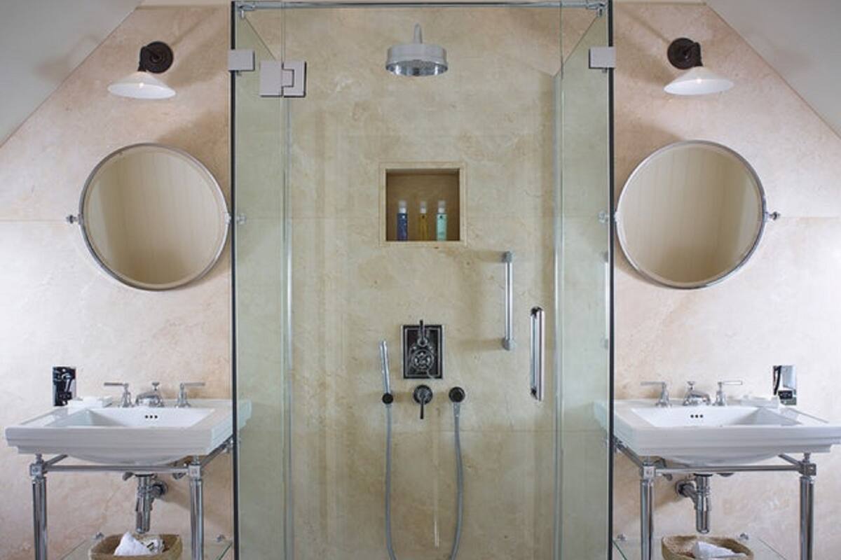 designer toiletries, hair dryer, bathrobes, slippers