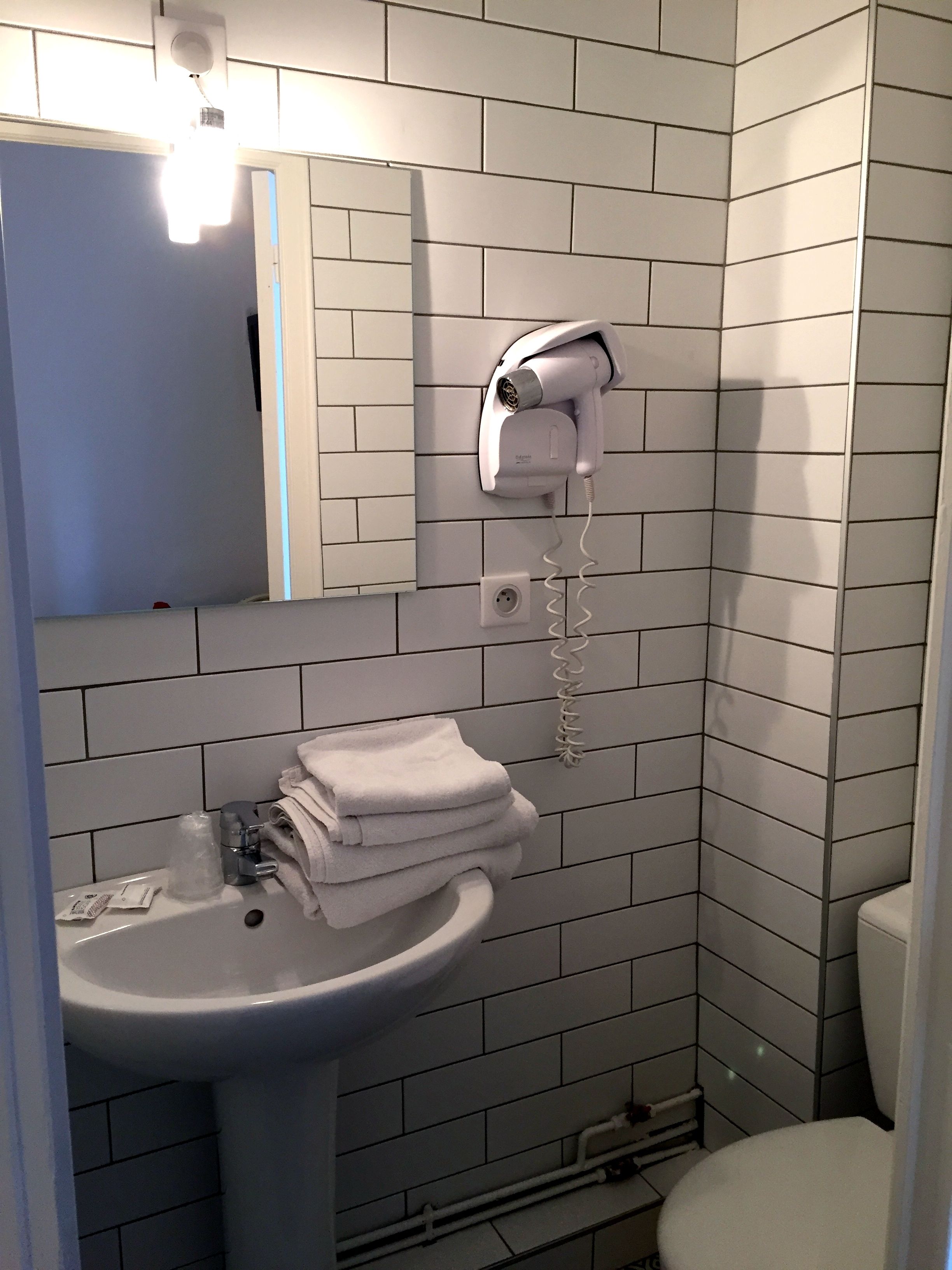 economy single room without window | bathroom | free toiletries, hair dryer, towels