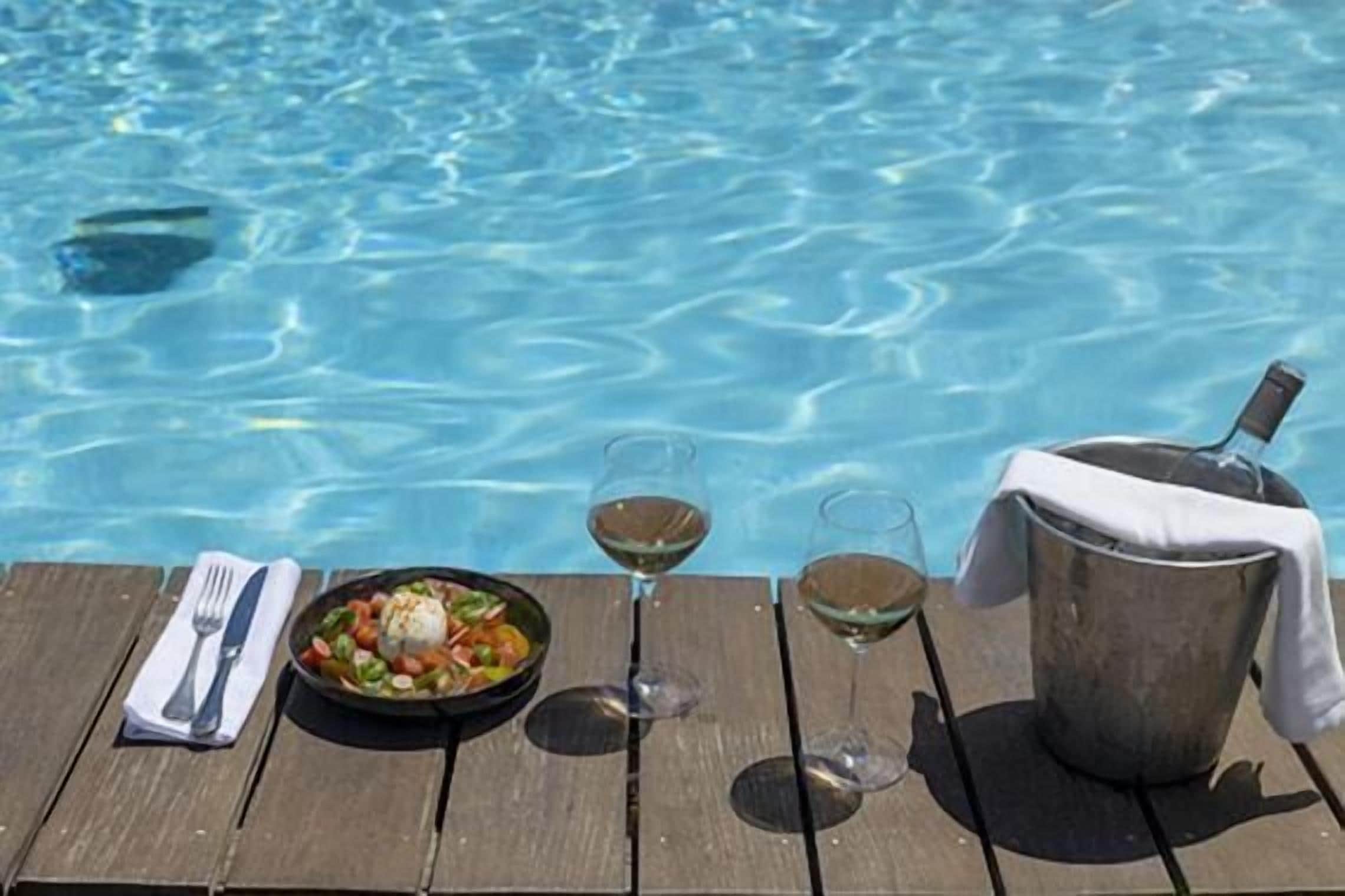 seasonal outdoor pool, pool umbrellas, pool loungers