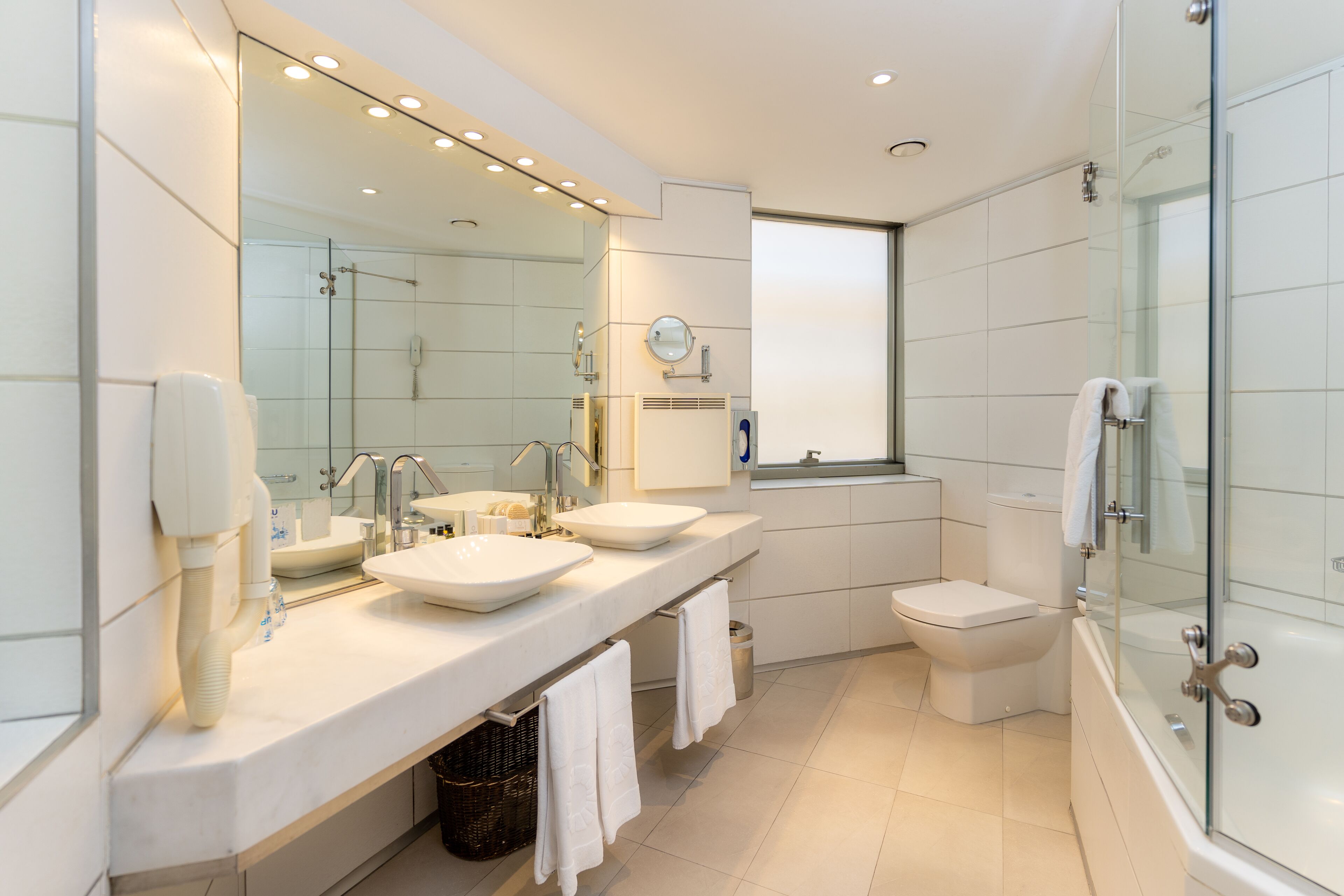 suite | bathroom | hair dryer, towels