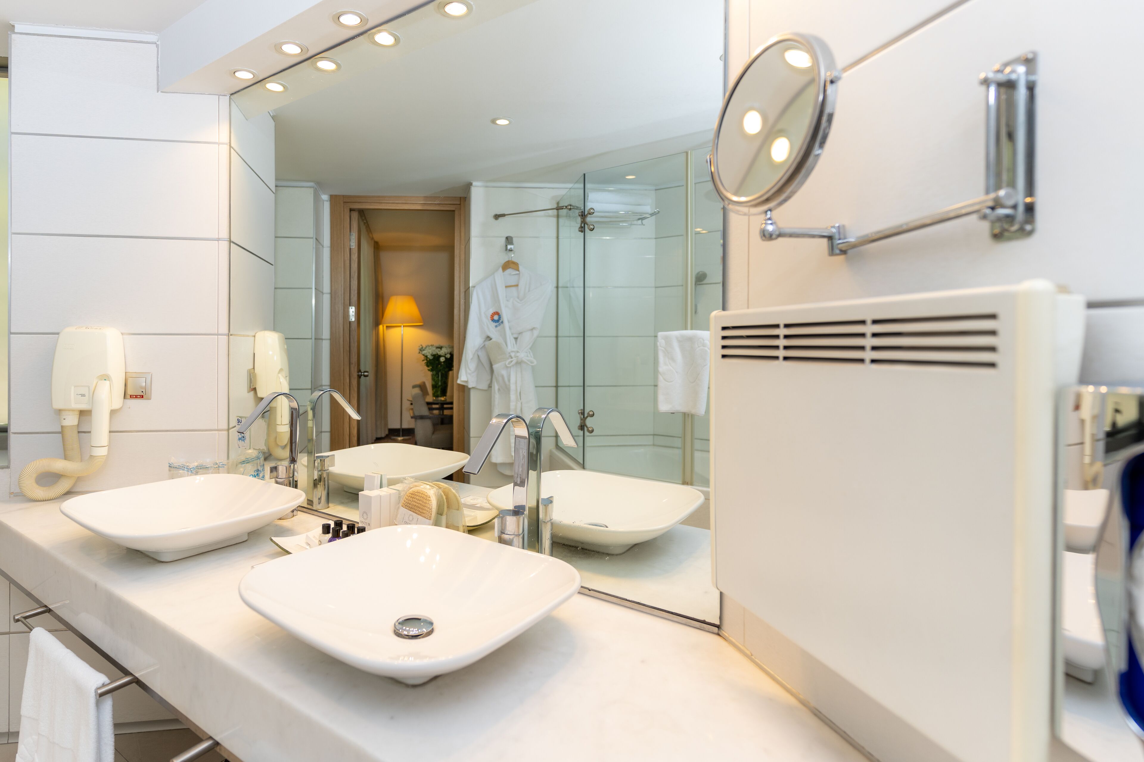 suite | bathroom | hair dryer, towels