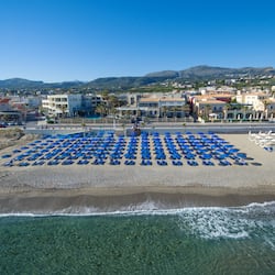On the beach, sun-loungers, beach umbrellas