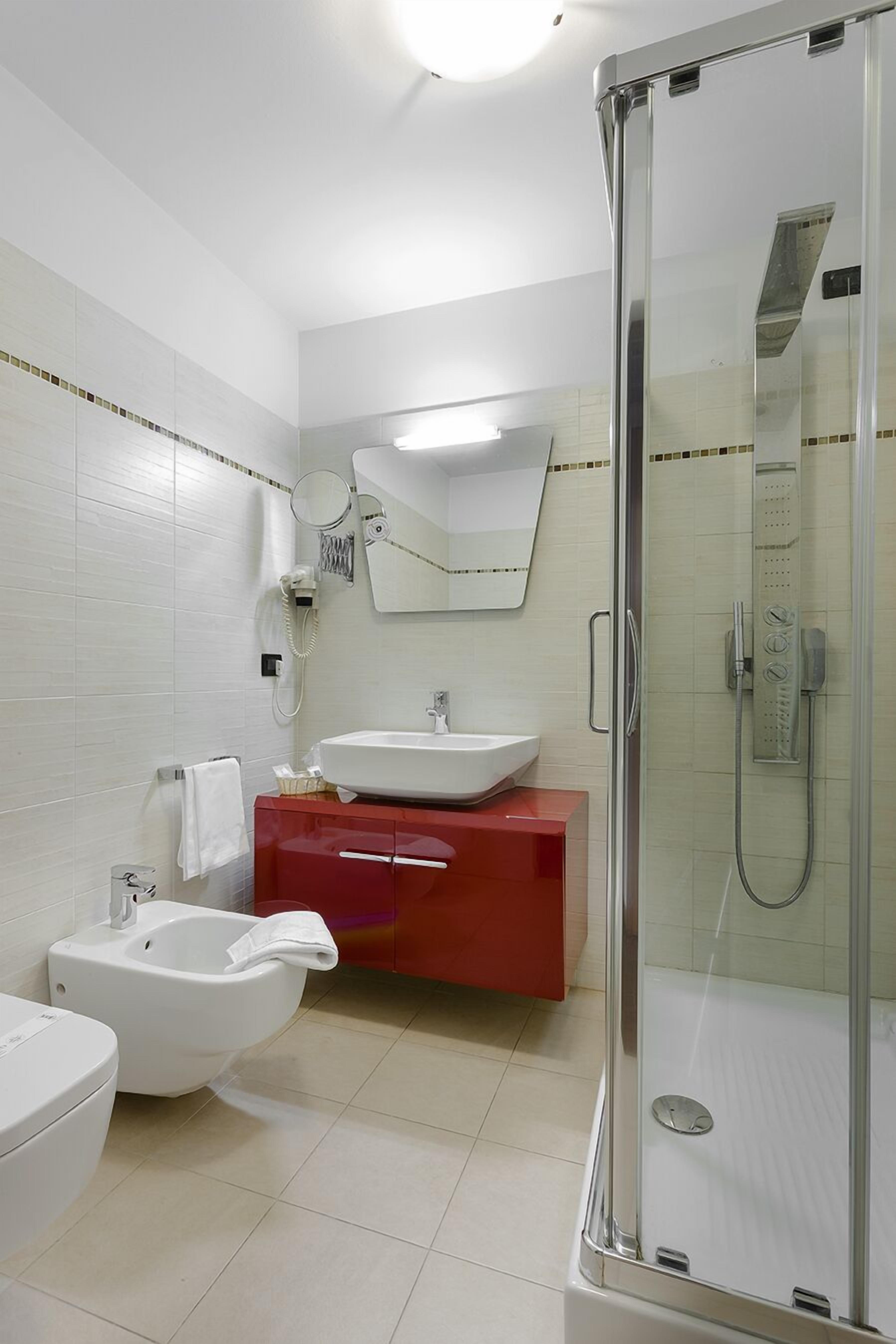superior double room | bathroom | rainfall showerhead, free toiletries, hair dryer, bidet