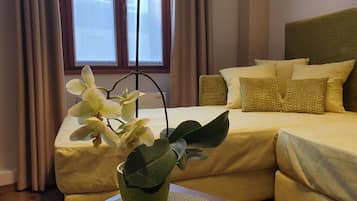 Family Room | 2 bedrooms, minibar, in-room safe, individually furnished