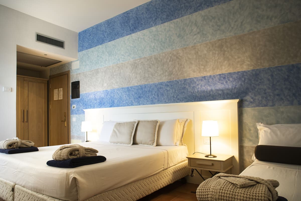 superior triple room | minibar, in-room safe, desk, soundproofing