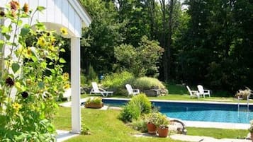 Seasonal outdoor pool, pool umbrellas, sun loungers