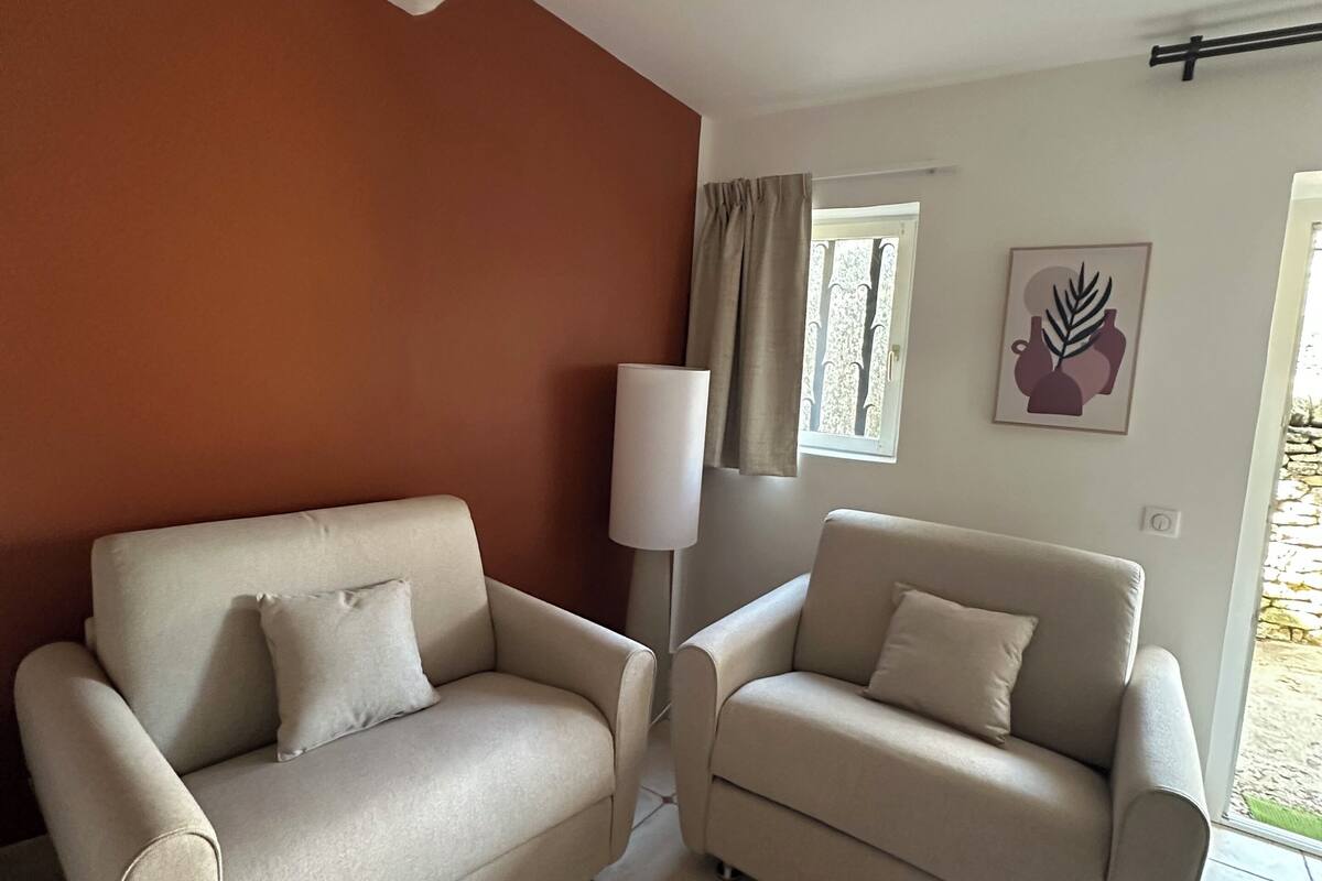 superior quadruple room, multiple beds, ground floor | living area | 80-cm led tv with satellite channels, tv, ipod dock