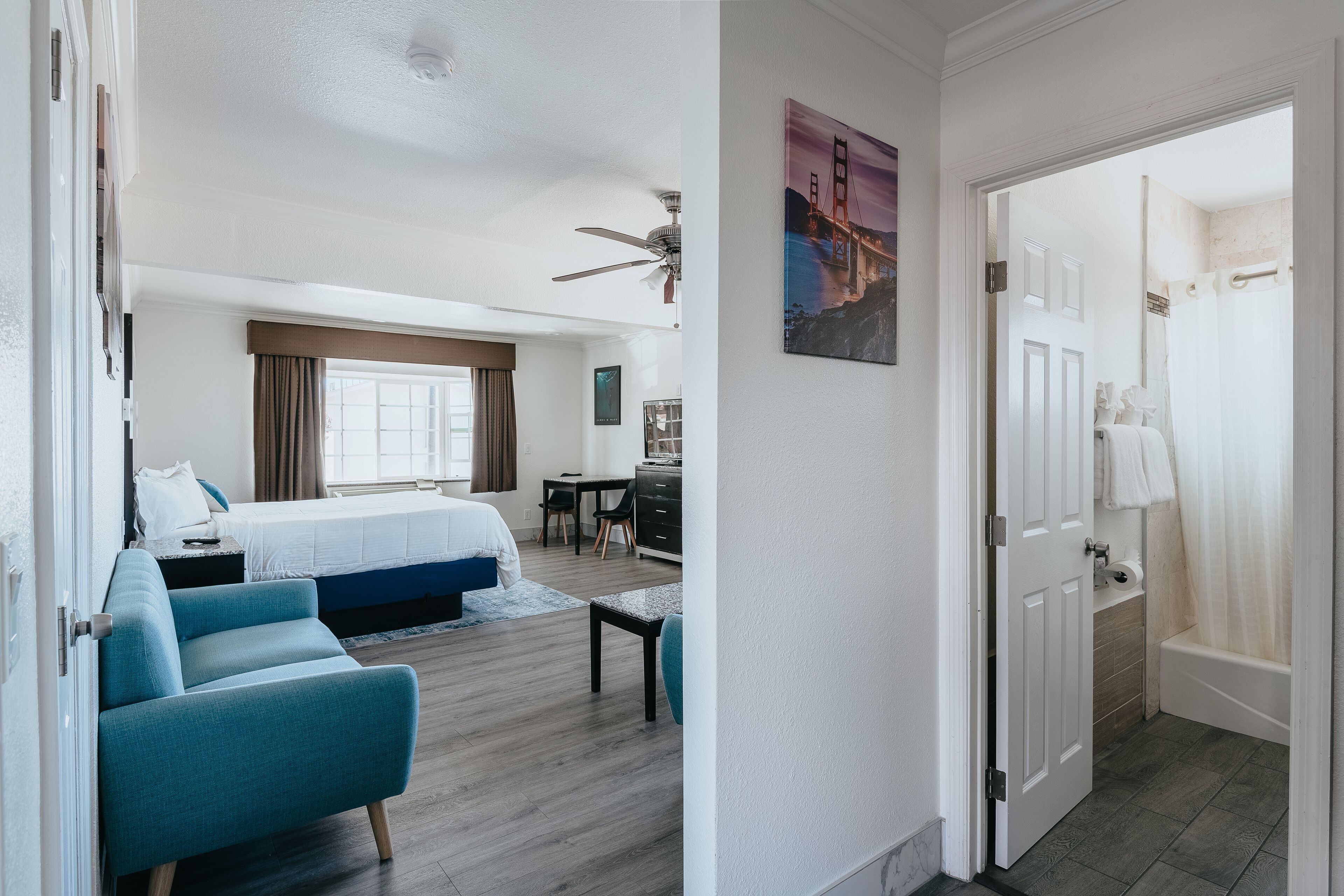 Deluxe Suite, 1 King Bed, Non Smoking, Pets Not Allowed (Upstairs, Ocean View) | Premium bedding, pillowtop beds, desk, laptop workspace