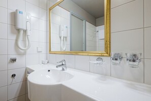 Articles de tocador gratuïts, assecador de cabells i tovalloles 