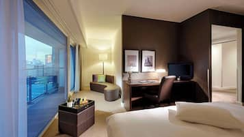 Premium bedding, pillow-top beds, free minibar, in-room safe