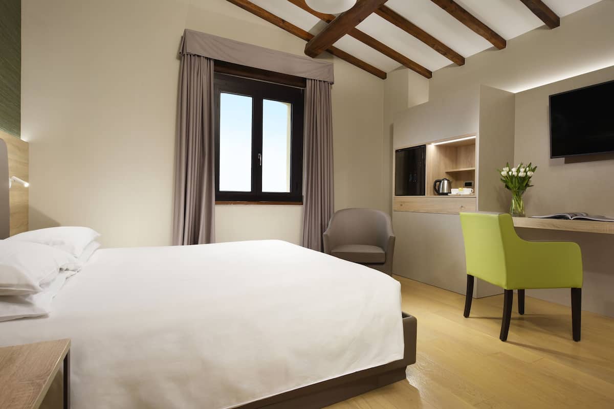 Couette en duvet d'oie, minibar, coffres-forts dans les chambres