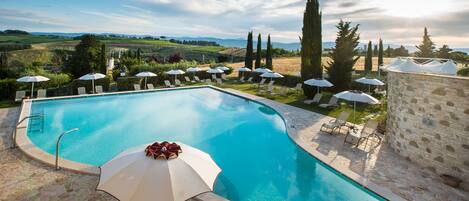 Indoor pool, 2 outdoor pools, open 9:00 AM to 7:00 PM, pool umbrellas