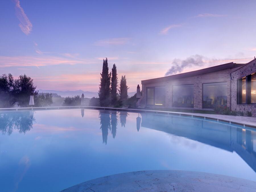 Indoor pool, 2 outdoor pools, open 9:00 AM to 7:00 PM, pool umbrellas