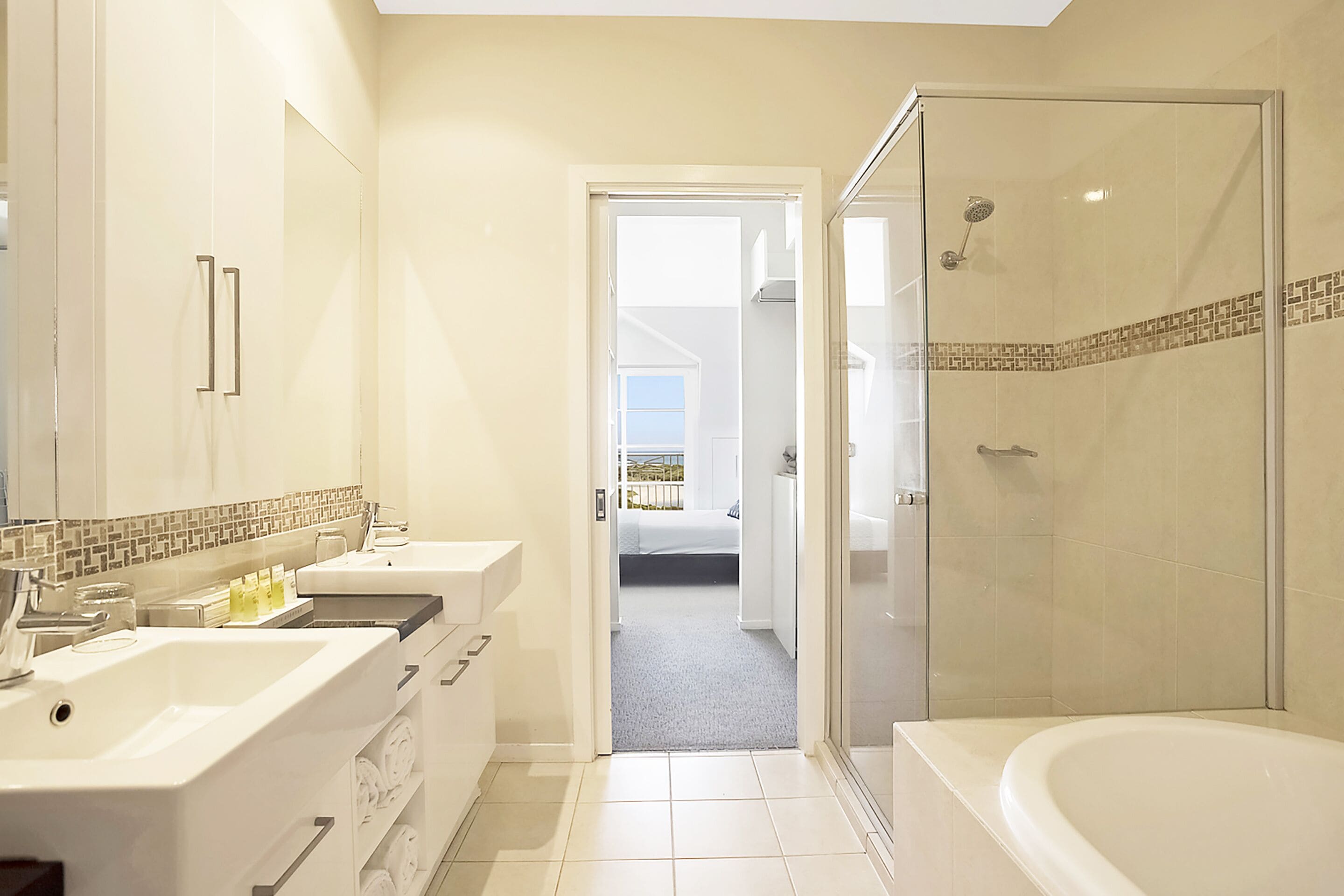 eco-friendly toiletries, hair dryer, towels, toilet paper