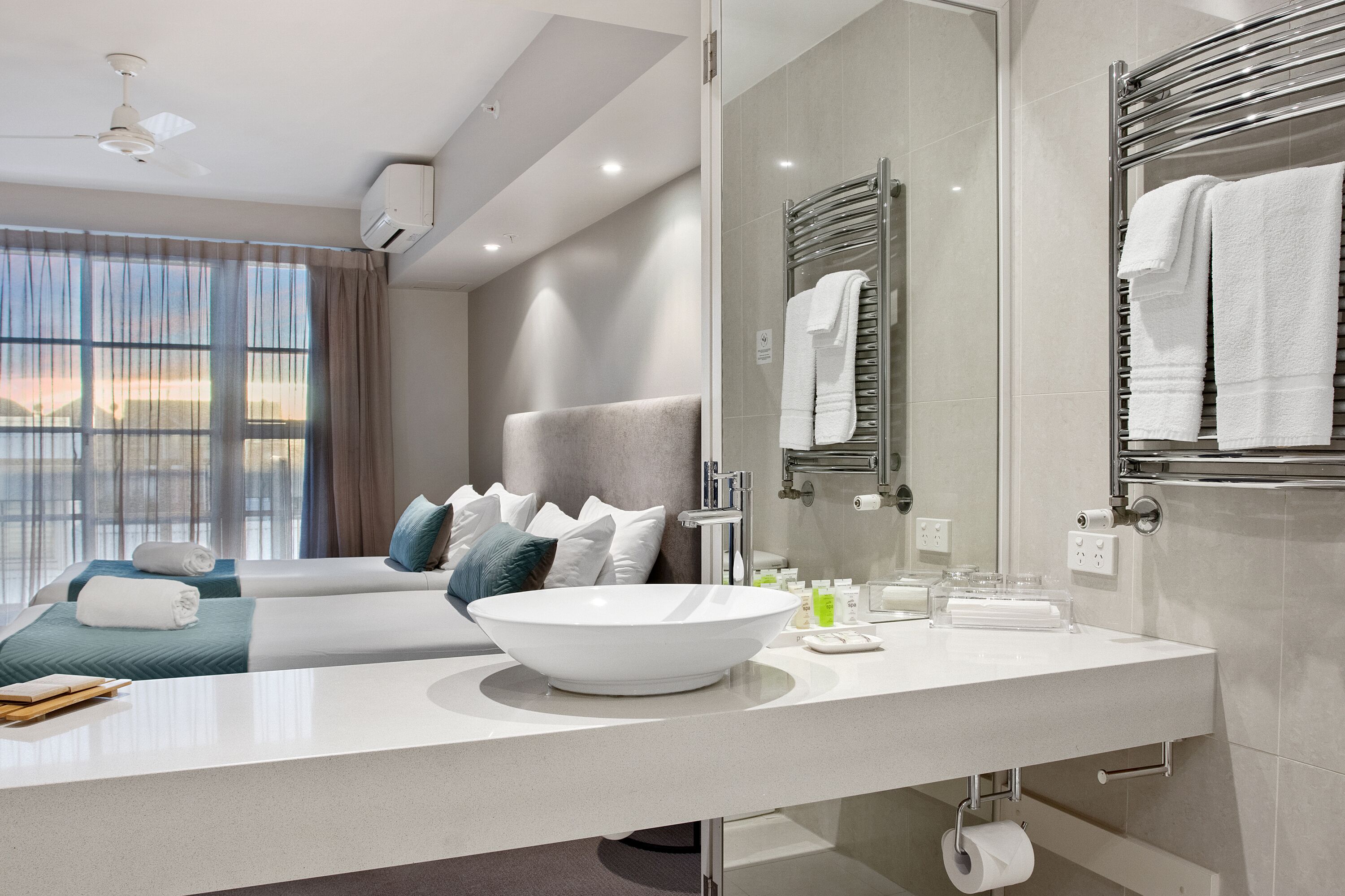 standard twin room | bathroom | eco-friendly toiletries, hair dryer, towels, toilet paper