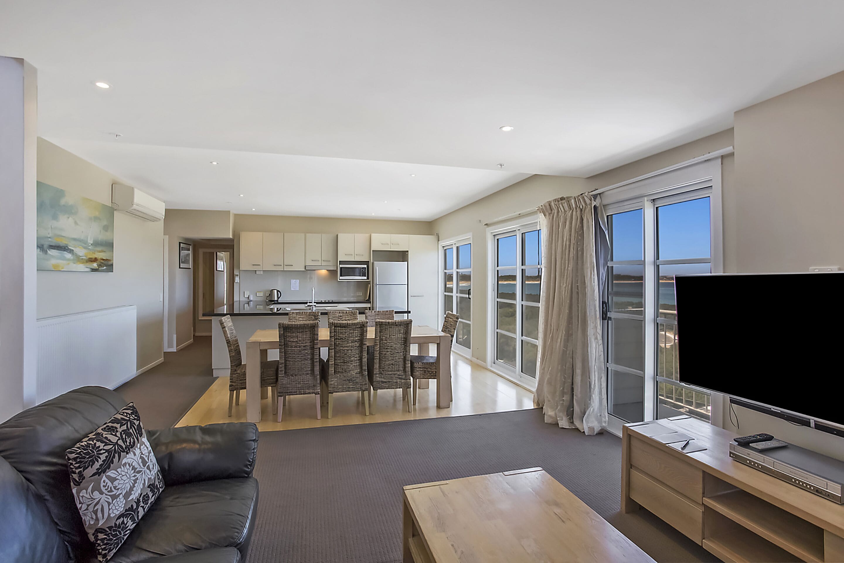 panoramic four bedroom penthouse | living area | 42-inch tv with satellite channels, pay films