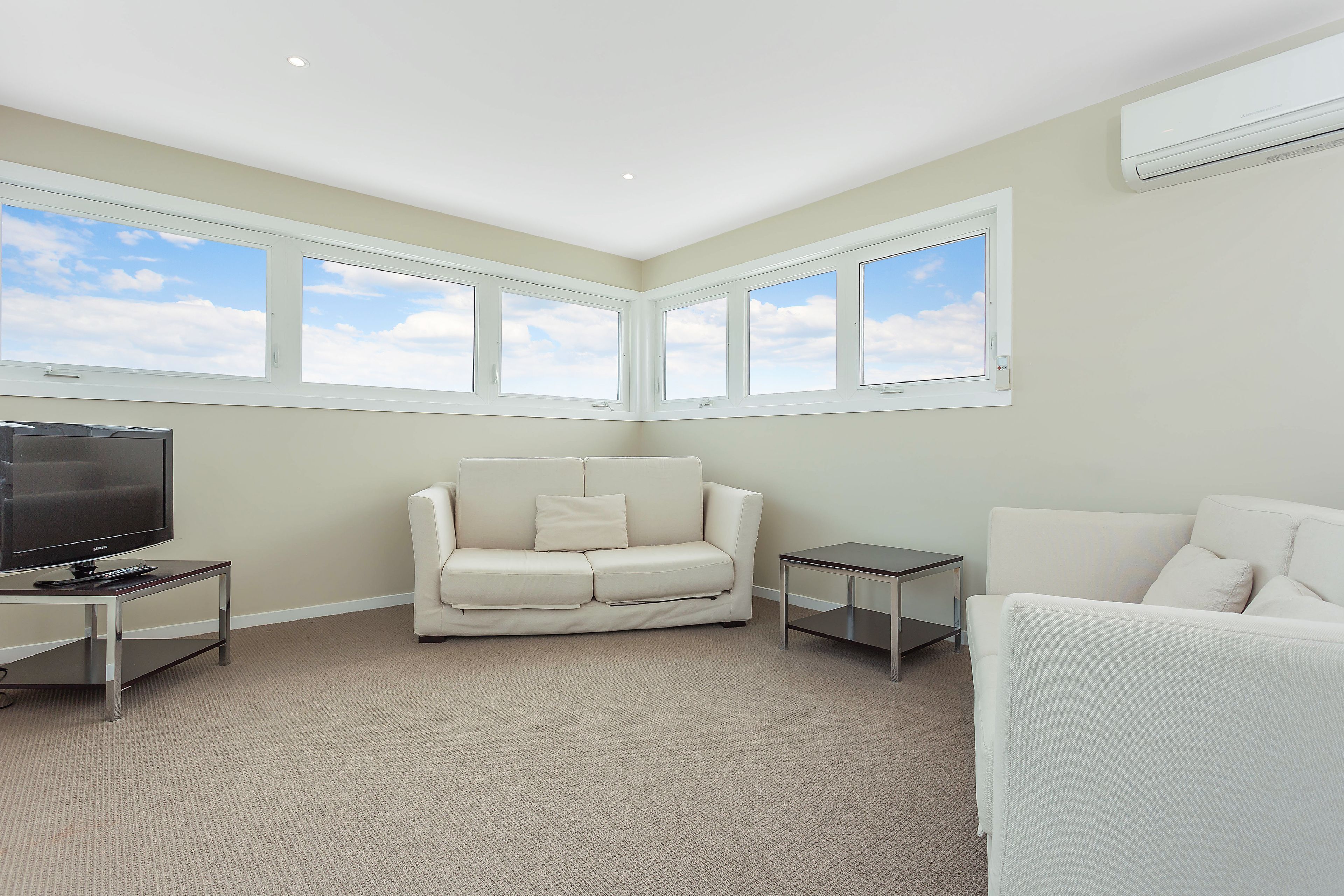 three bedroom penthouse apartment  | living area | 42-inch tv with satellite channels, pay films