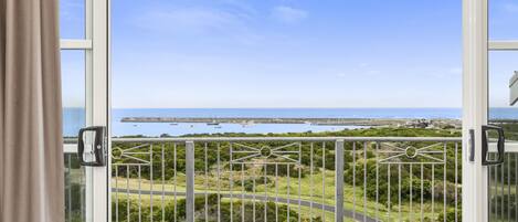 Enjoy unobstructed views of the coastal landscape from this balcony.