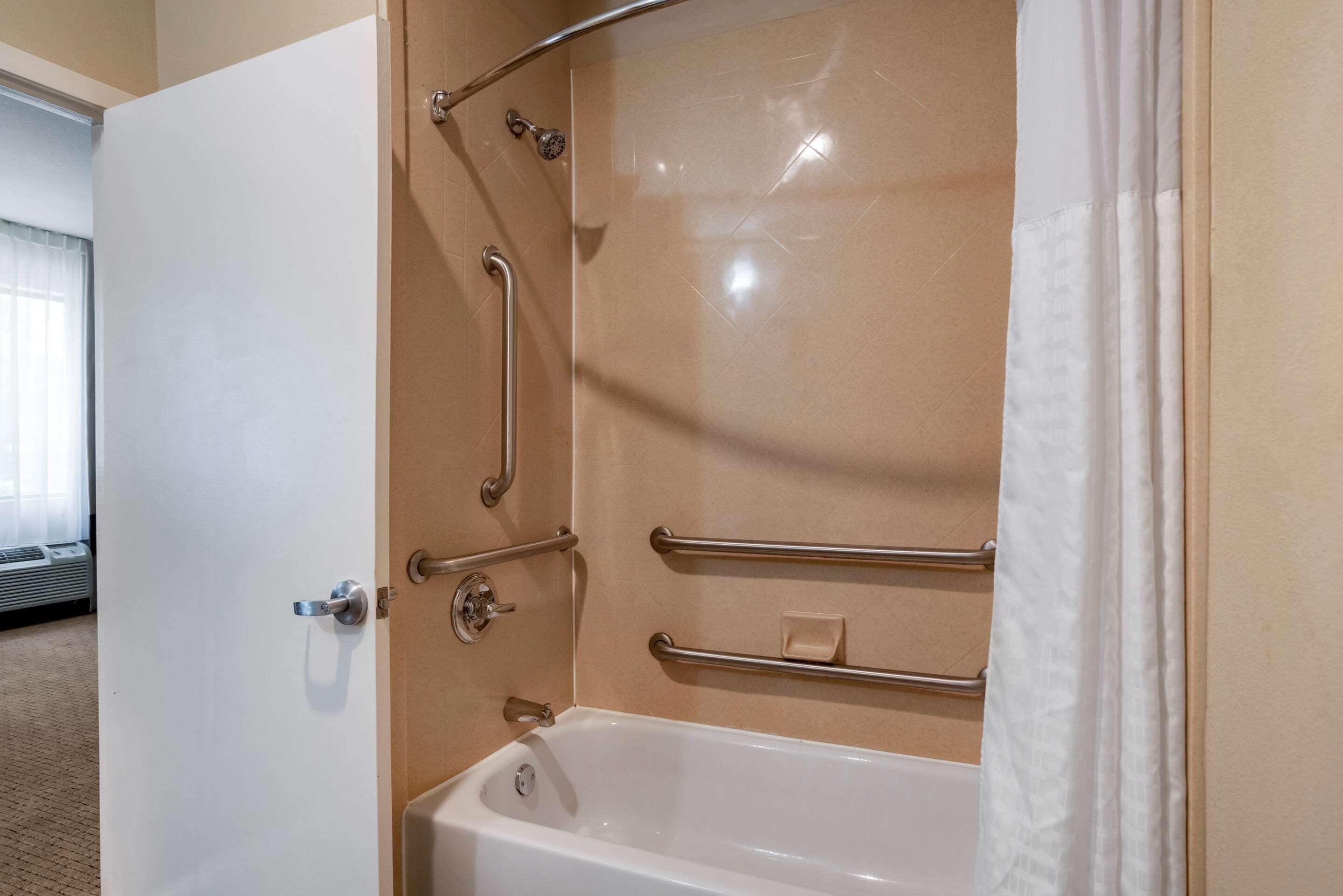 combined shower/bathtub, free toiletries, hair dryer, towels
