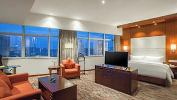 Suite, 1 King Bed (Additional Living Area) | Minibar, in-room safe, desk, iron/ironing board