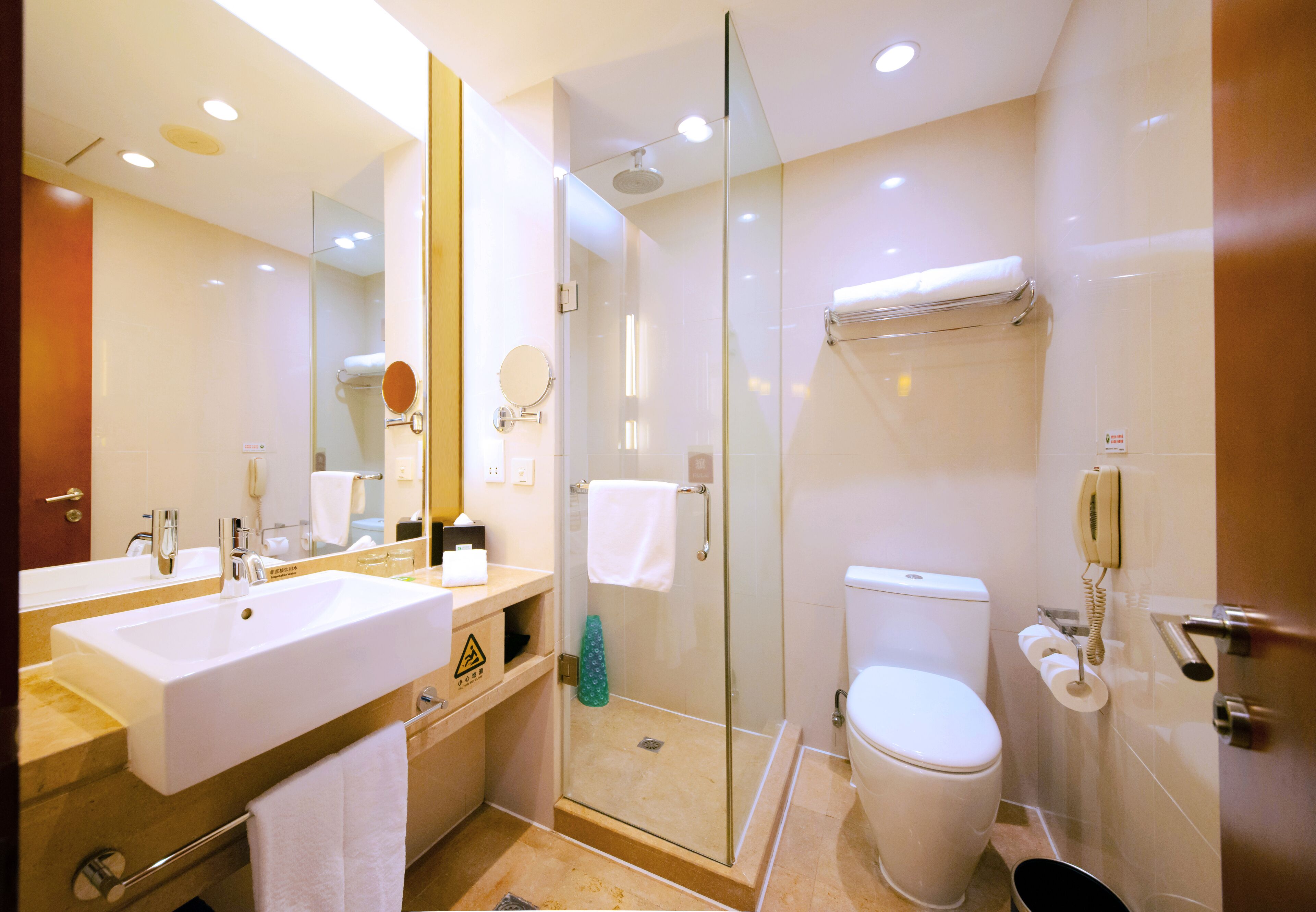 Combined shower/bathtub, hair dryer, bathrobes, towels