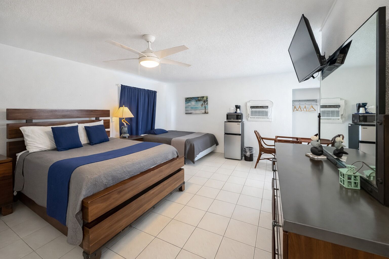 Grand Room | Premium bedding, laptop workspace, blackout drapes, iron/ironing board