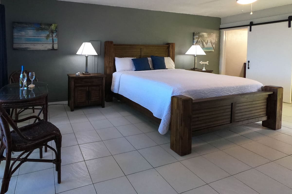 1 bedroom, premium bedding, laptop workspace, blackout curtains