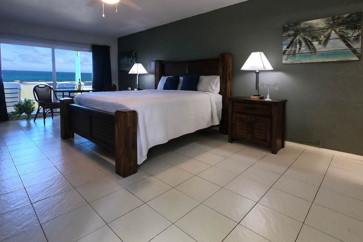 1 bedroom, premium bedding, laptop workspace, blackout curtains