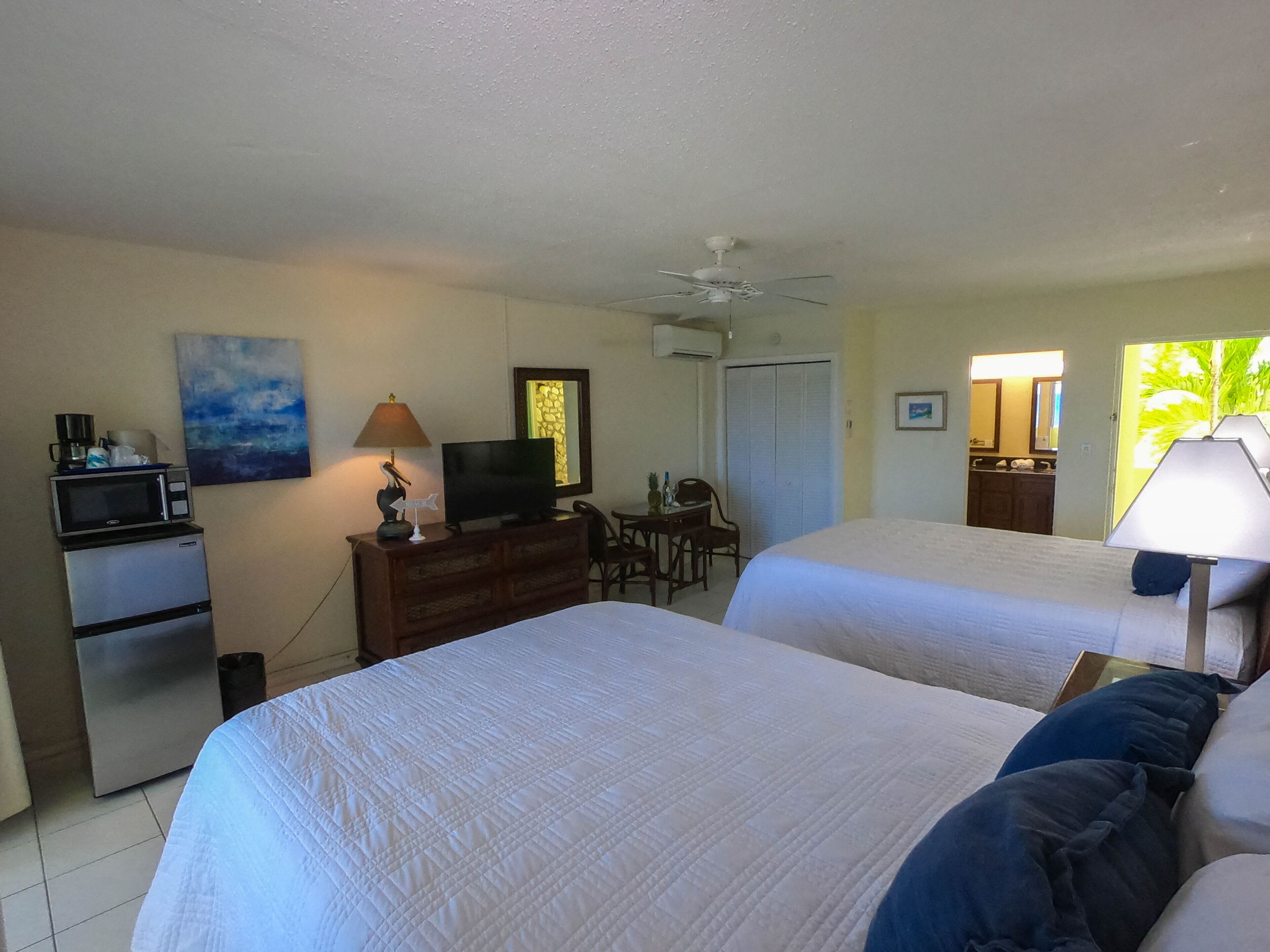 room, 2 queen beds, beachfront | 1 bedroom, premium bedding, laptop workspace, blackout curtains