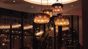 A chandelier with multiple tiers hanging from the ceiling.