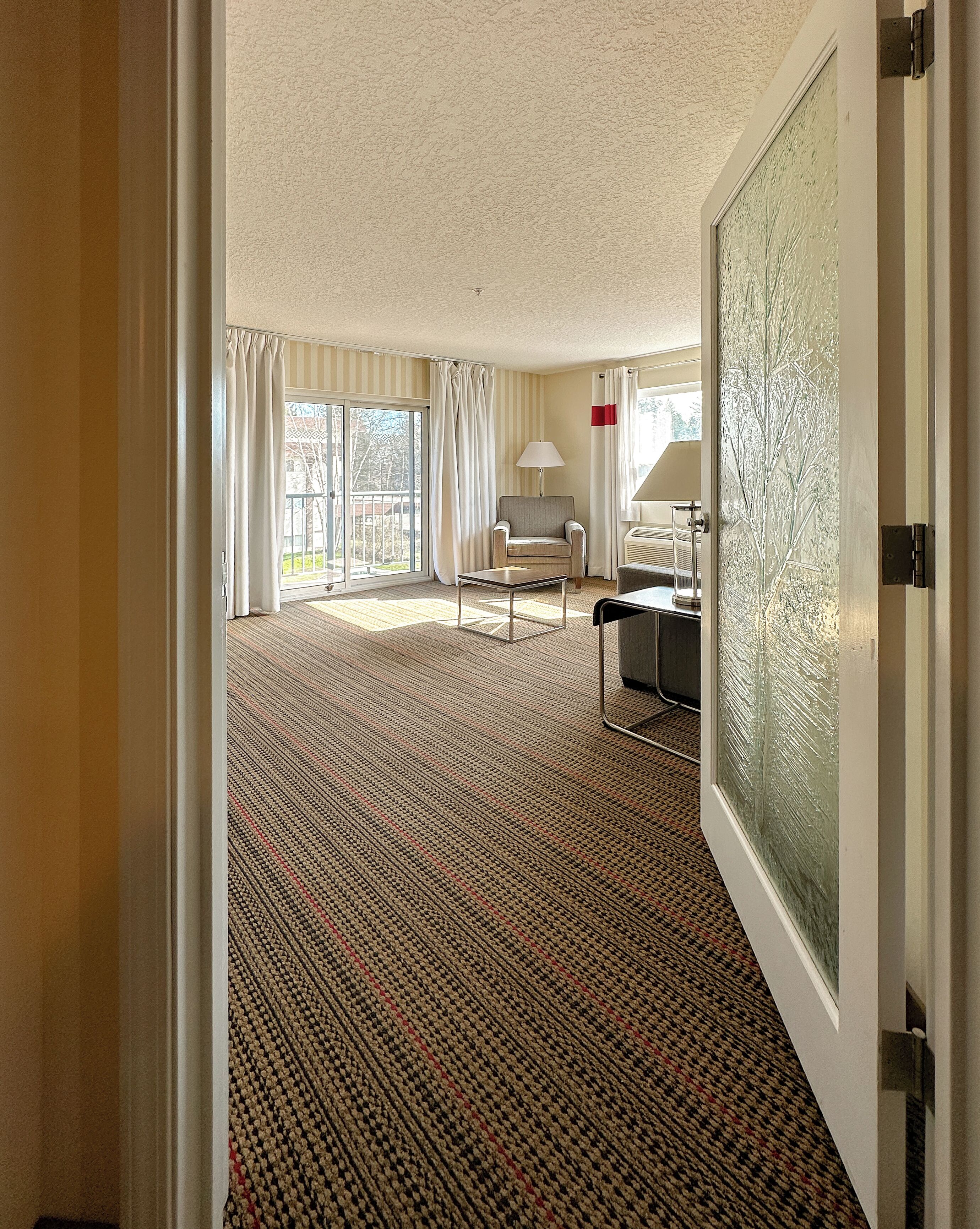 superior suite, 2 queen beds | living area | 42-inch smart tv with cable channels