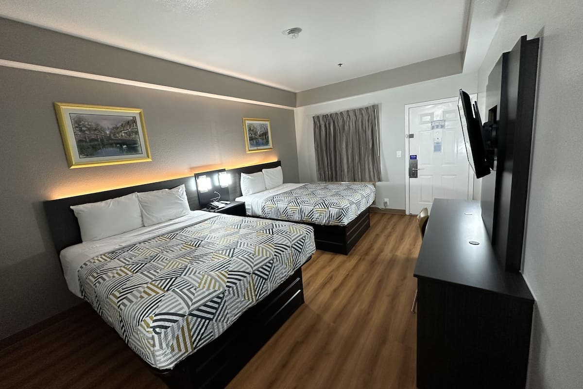 Desk, laptop workspace, free WiFi, bed sheets