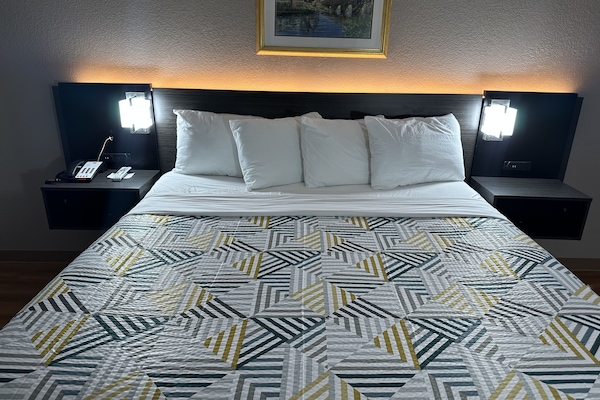 Desk, laptop workspace, WiFi (free), bed sheets