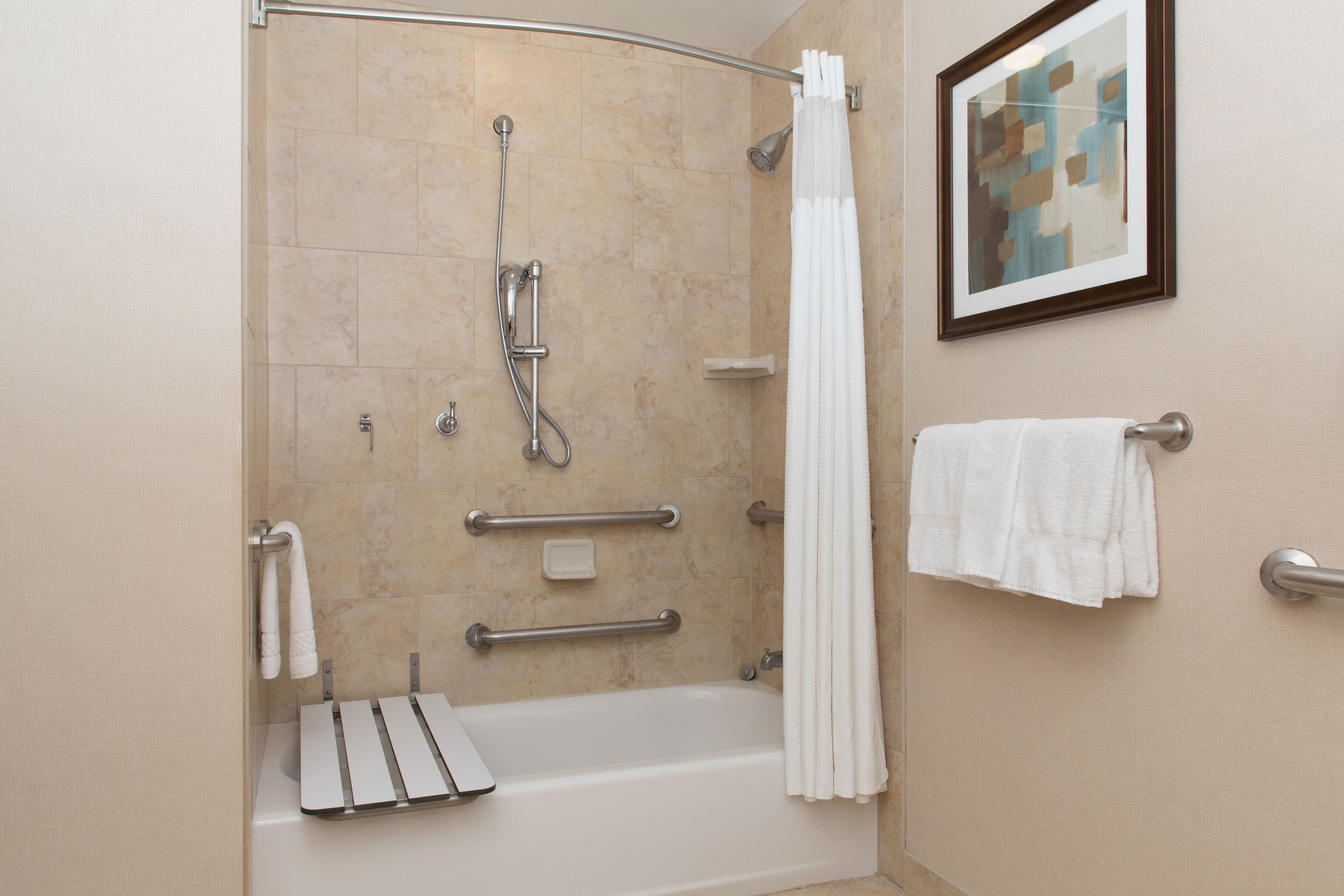 combined shower/bathtub, free toiletries, hair dryer, towels