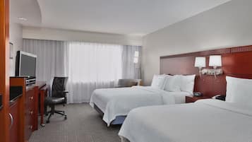 Hypo-allergenic bedding, desk, laptop workspace, blackout curtains