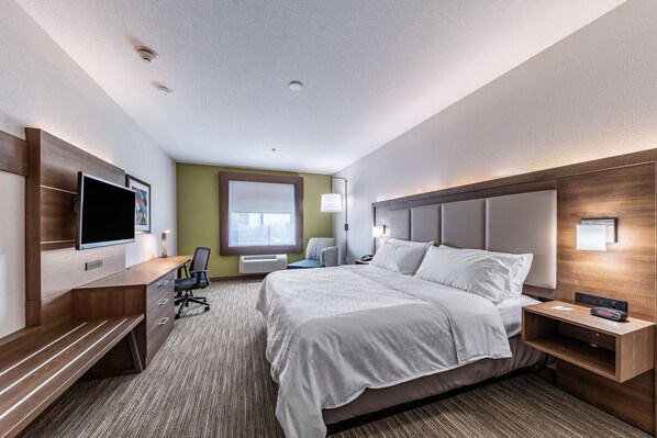 A hotel room with a bed, a desk, a chair, a TV, and a window. - Holiday Inn Express & Suites Fort Worth - Fossil Creek by IHG (Fort Worth)