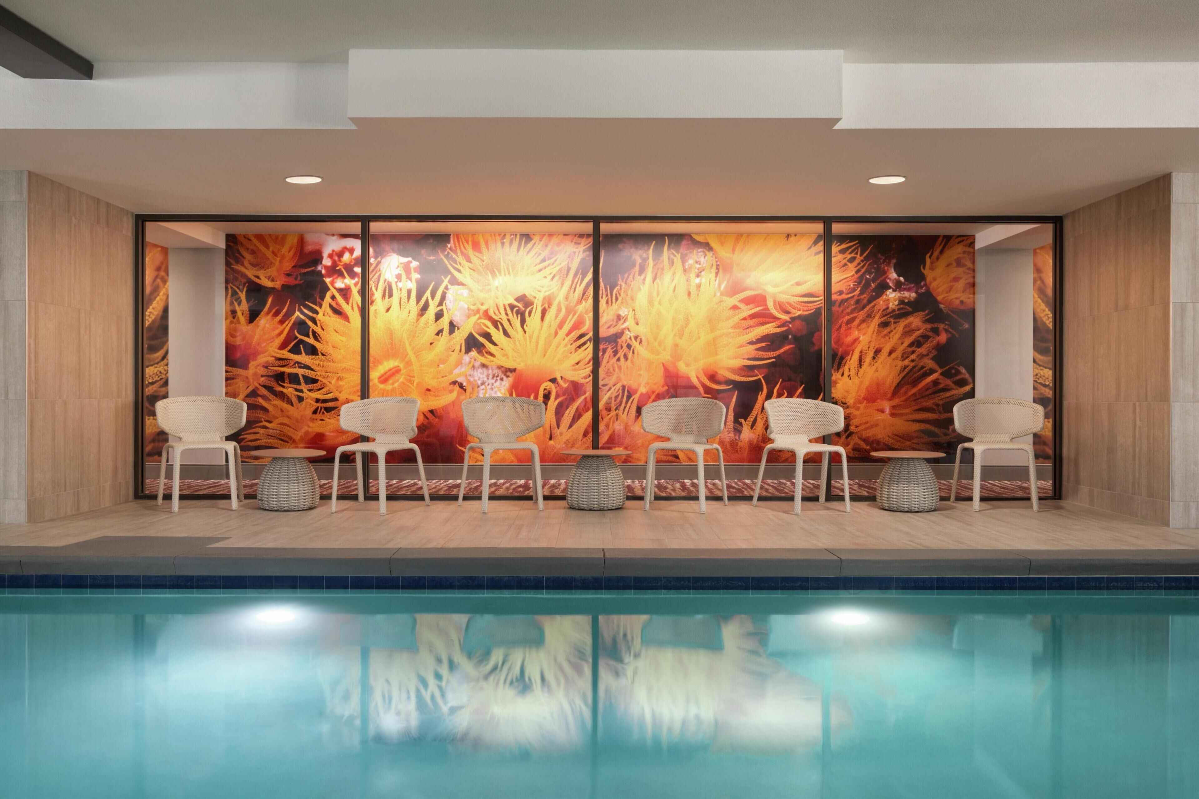 Indoor pool, outdoor pool, open 7 AM to 10:00 PM, pool loungers