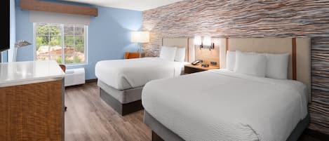 Premium bedding, pillowtop beds, desk, blackout drapes