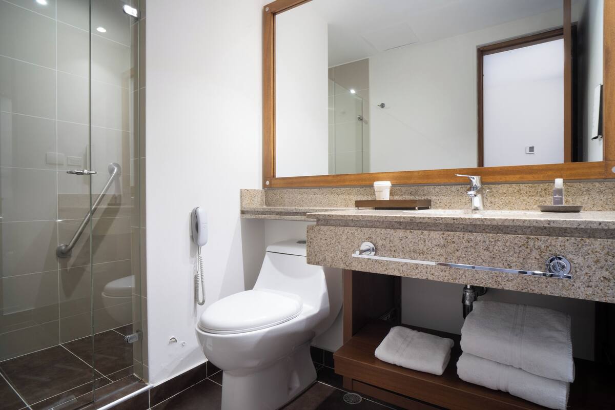 shower, rainfall showerhead, towels, soap