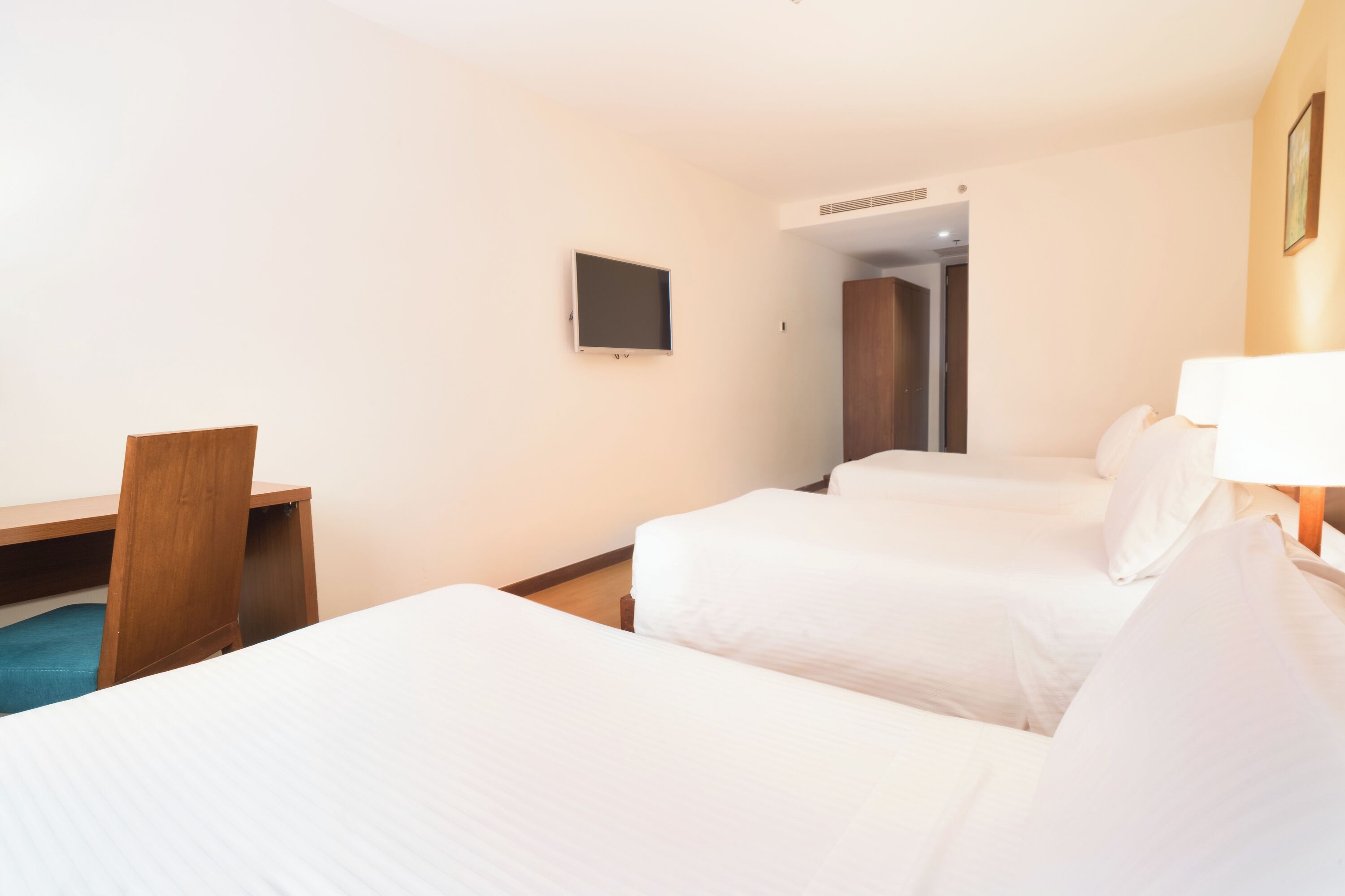 standard triple room, 3 single beds | 1 bedroom, premium bedding, down duvets, in-room safe