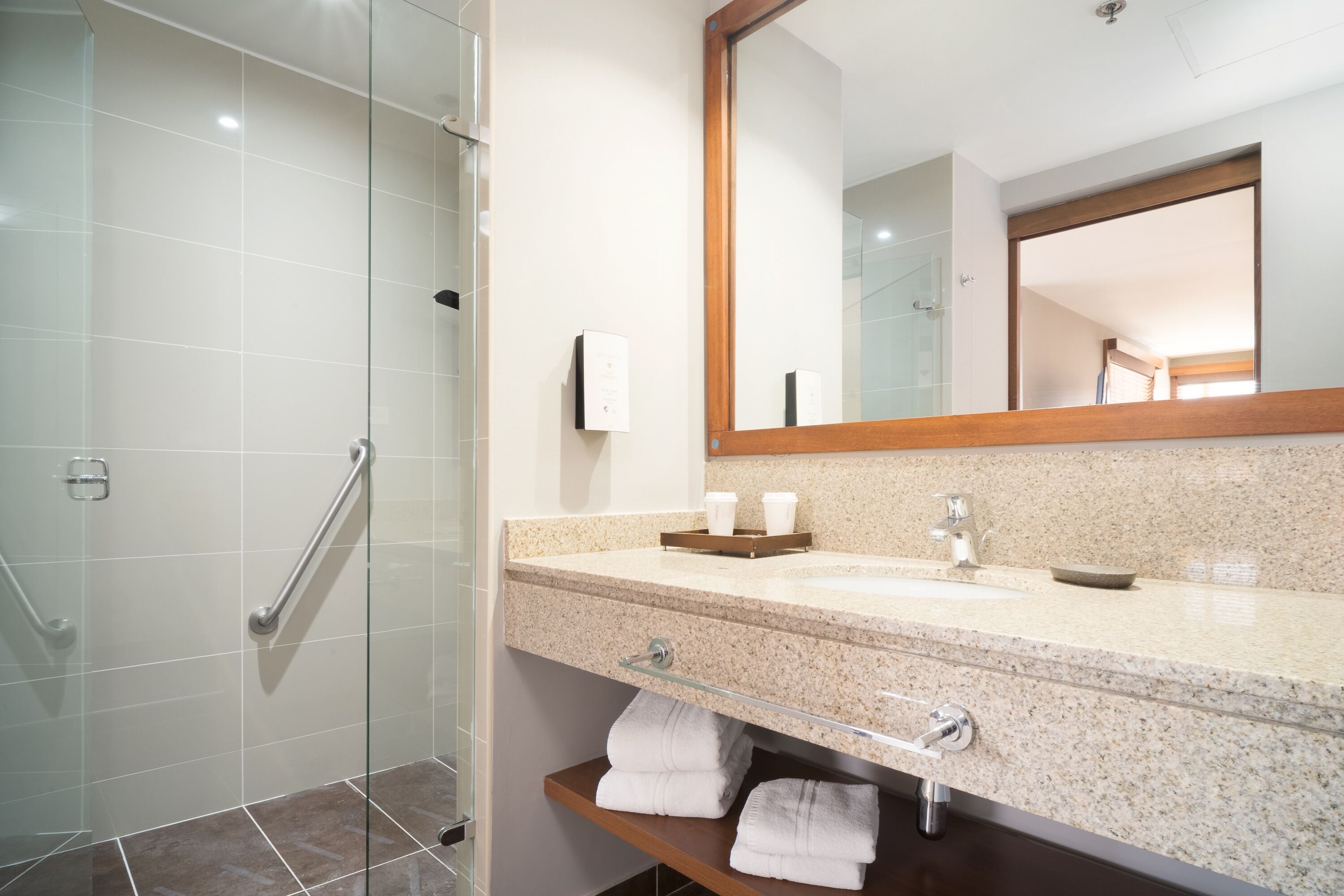 standard quadruple room | bathroom | shower, rainfall showerhead, towels, soap