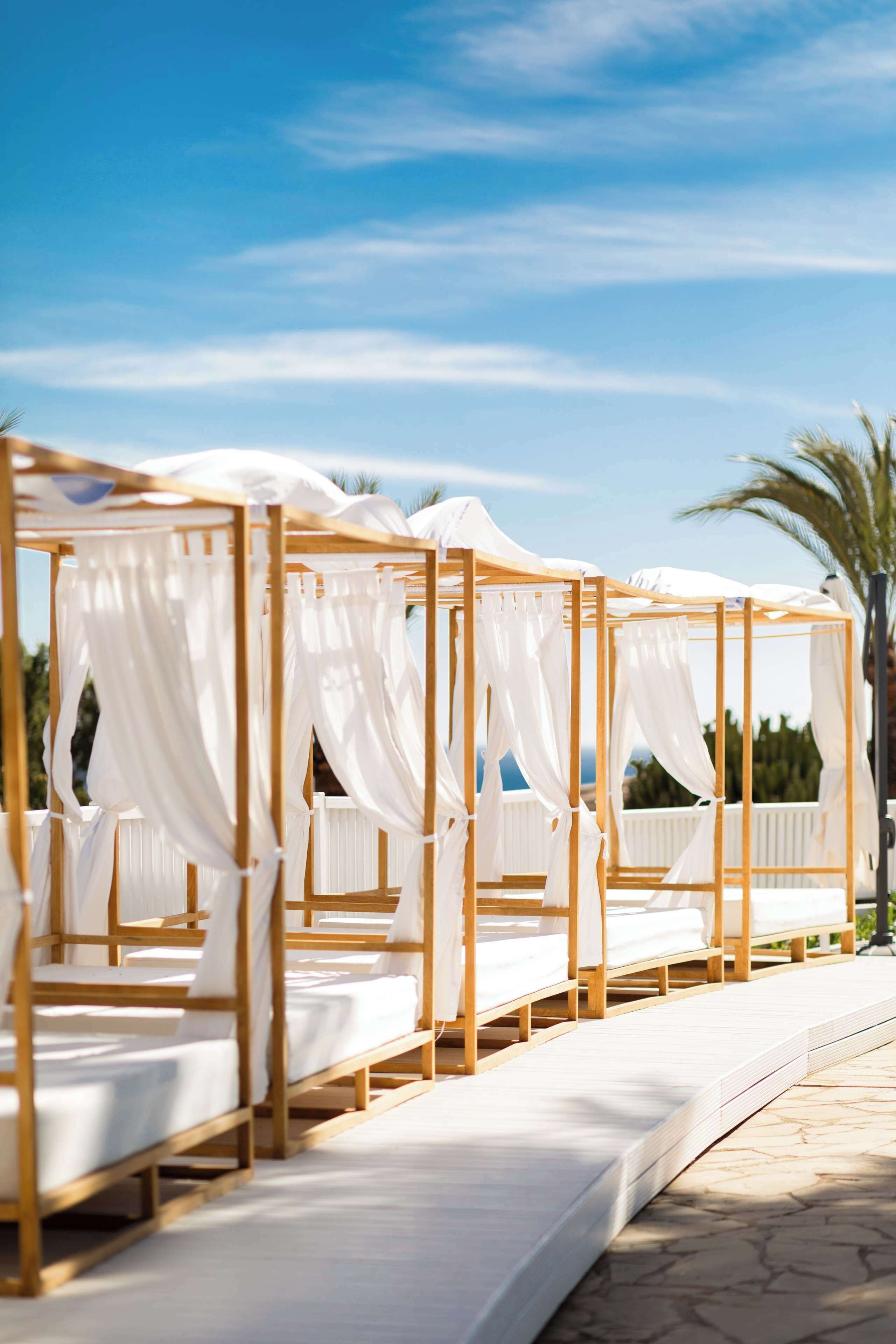 indoor pool, open 10:00 am to 6:00 pm, pool umbrellas, pool loungers