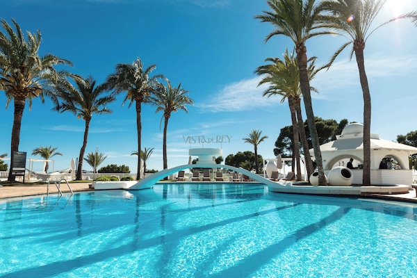 Indoor pool, open 10:00 AM to 6:00 PM, pool umbrellas, sun loungers