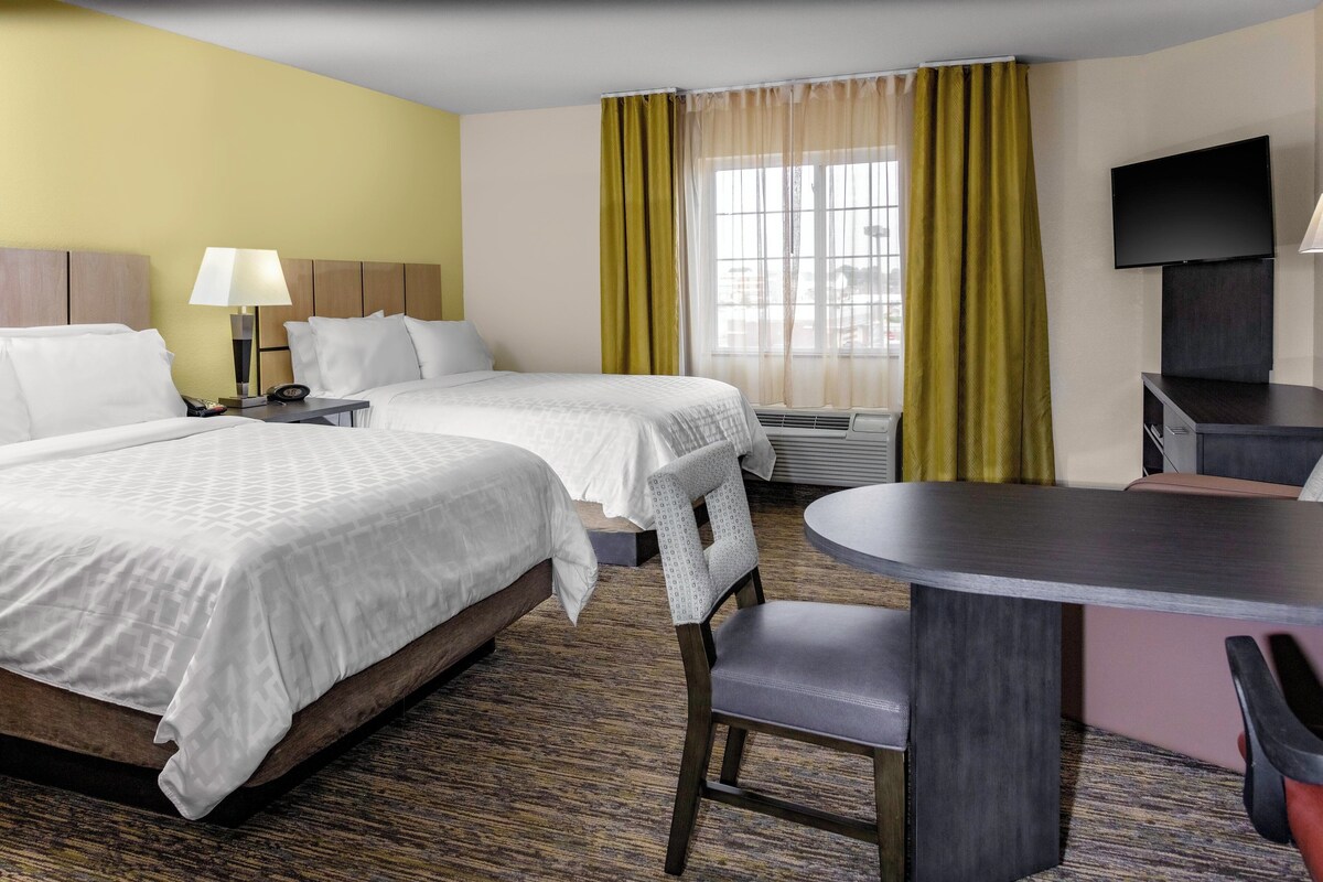 In-room safe, desk, iron/ironing board, cribs (free)