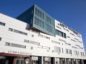 A hotel with a modern design, featuring a bar and restaurant on the ground floor. - The Louis Fitzgerald Hotel (Dublin)