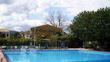 Outdoor pool, pool umbrellas, pool loungers