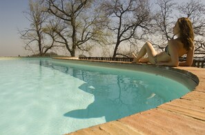 Outdoor pool, pool umbrellas, pool loungers