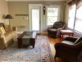 In-room television and other amenities at The Mango Inn Bed & Breakfast