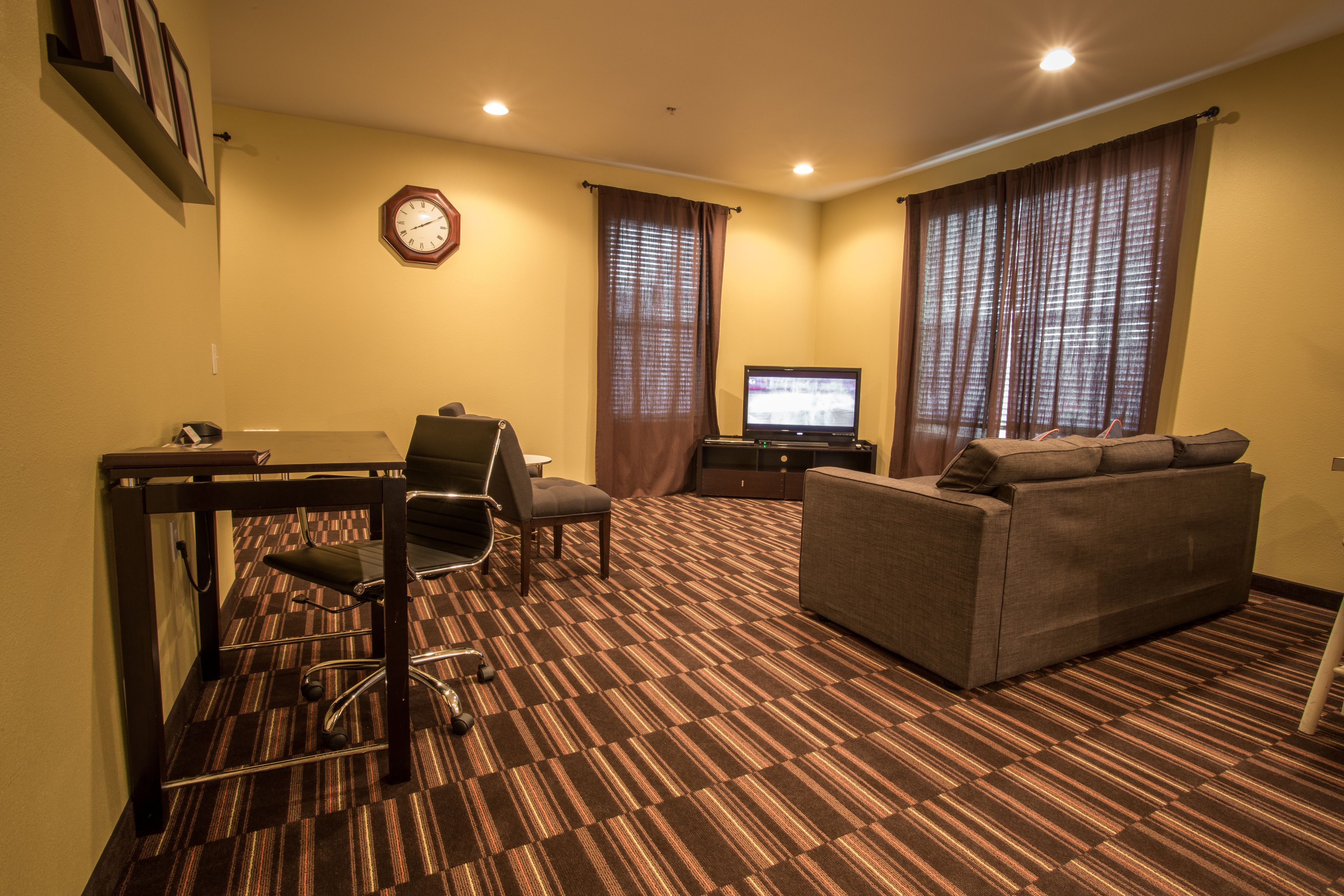 suite, 1 king bed with sofa bed | living area | 36-inch tv with cable channels, dvd player