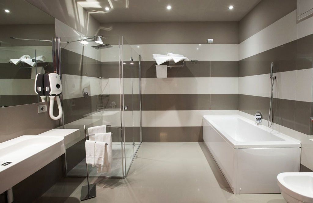 shower, rainfall showerhead, designer toiletries, hair dryer